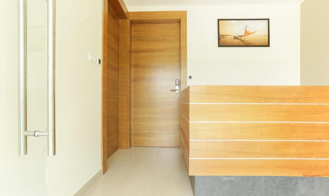 Treebo Trend Cmks Gulmohar Suites Kochi Exterior photo
