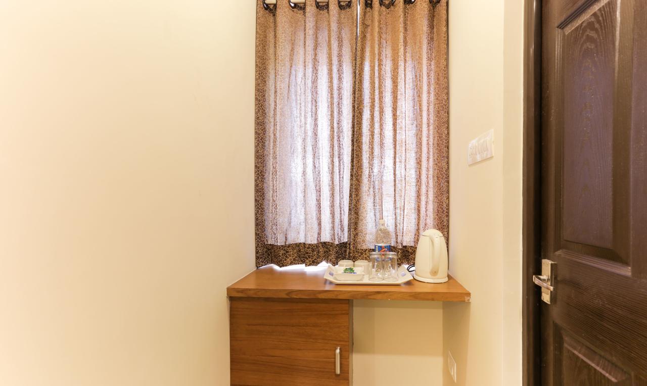 Treebo Trend Cmks Gulmohar Suites Kochi Exterior photo