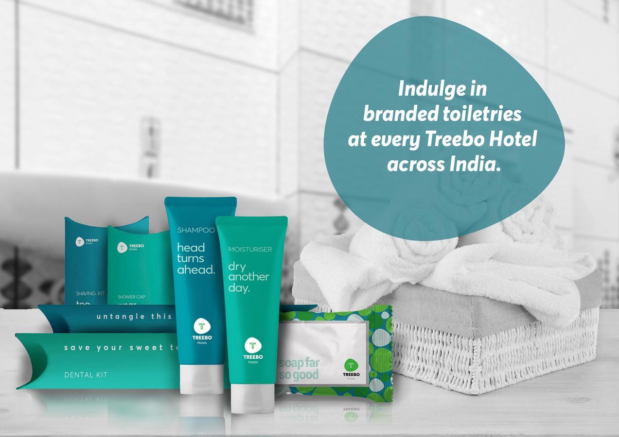 Treebo Trend Cmks Gulmohar Suites Kochi Exterior photo